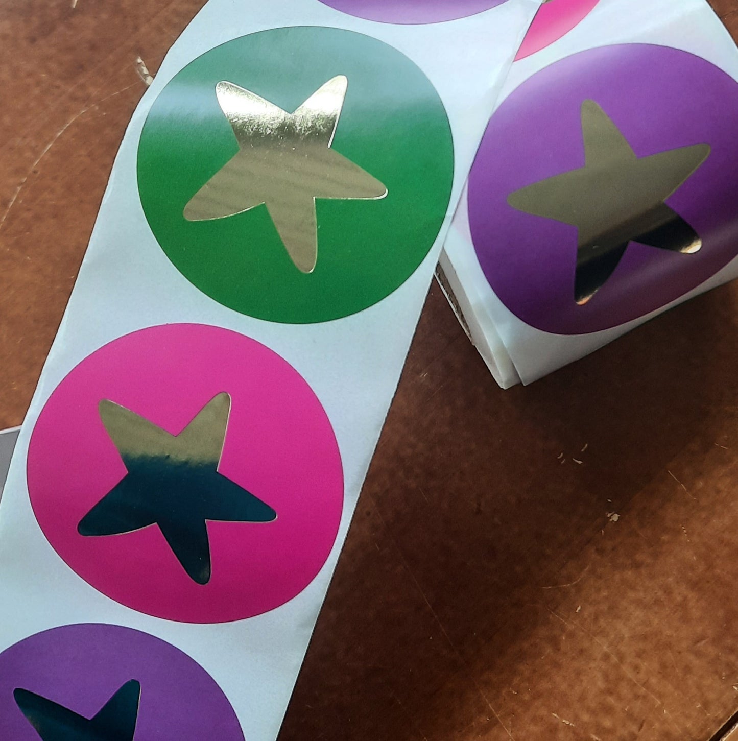 Sticker ster rond gekleurd