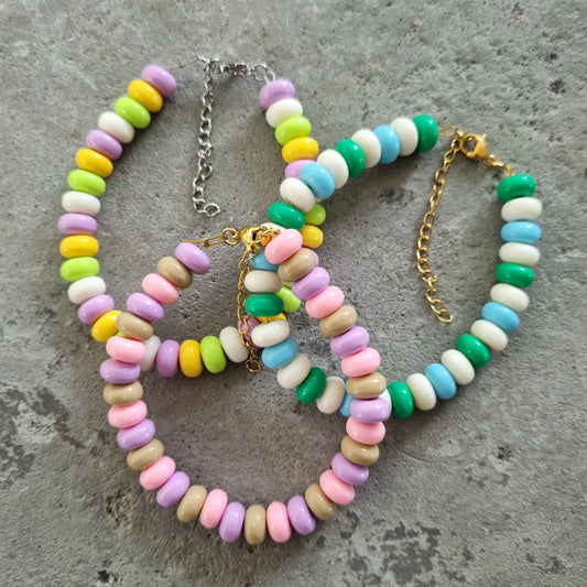 Armband snoepketting rondellen pink