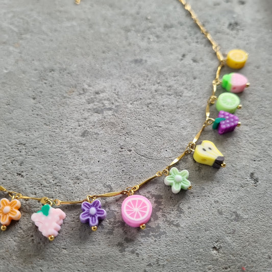 Ketting schakels fruit bloemetjes goud