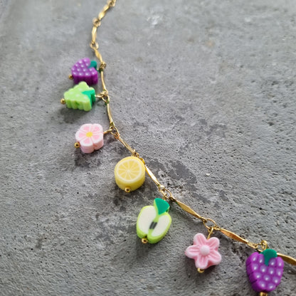 Ketting schakels fruit bloemetjes goud