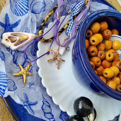 Ketting satijnkoord zeester goud