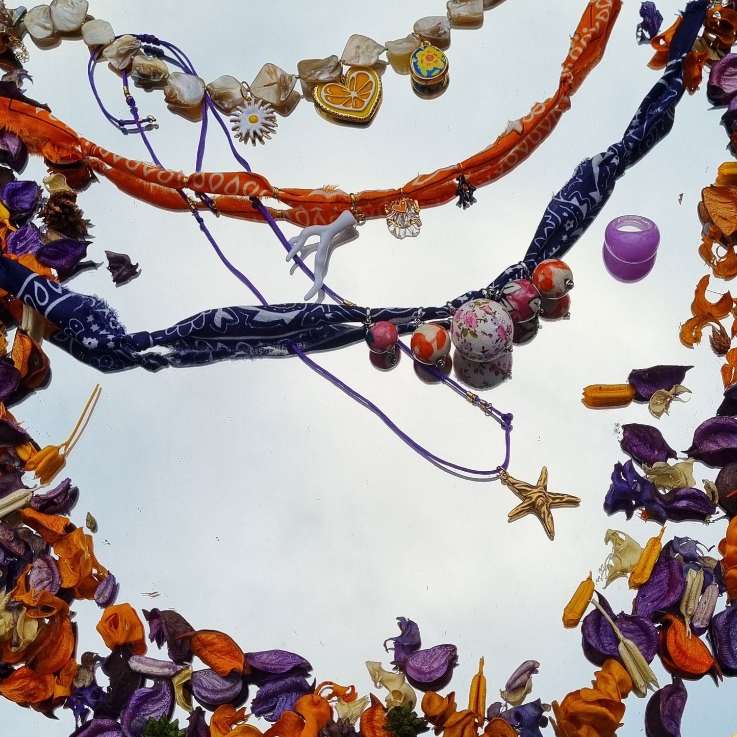 Ketting satijnkoord zeester goud