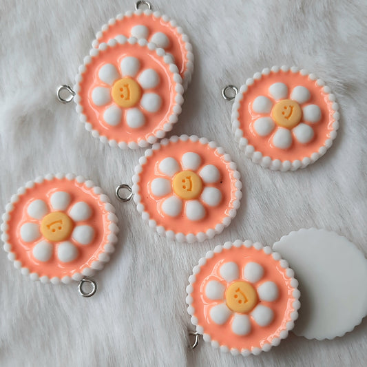 Bedel bloem rond smiley oranje