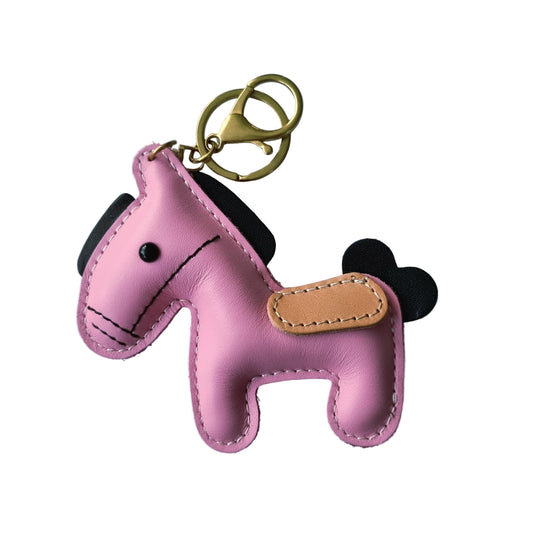 Tashanger paard roze (bruin zadel)
