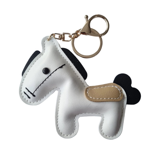 Tashanger paard wit (beige zadel)