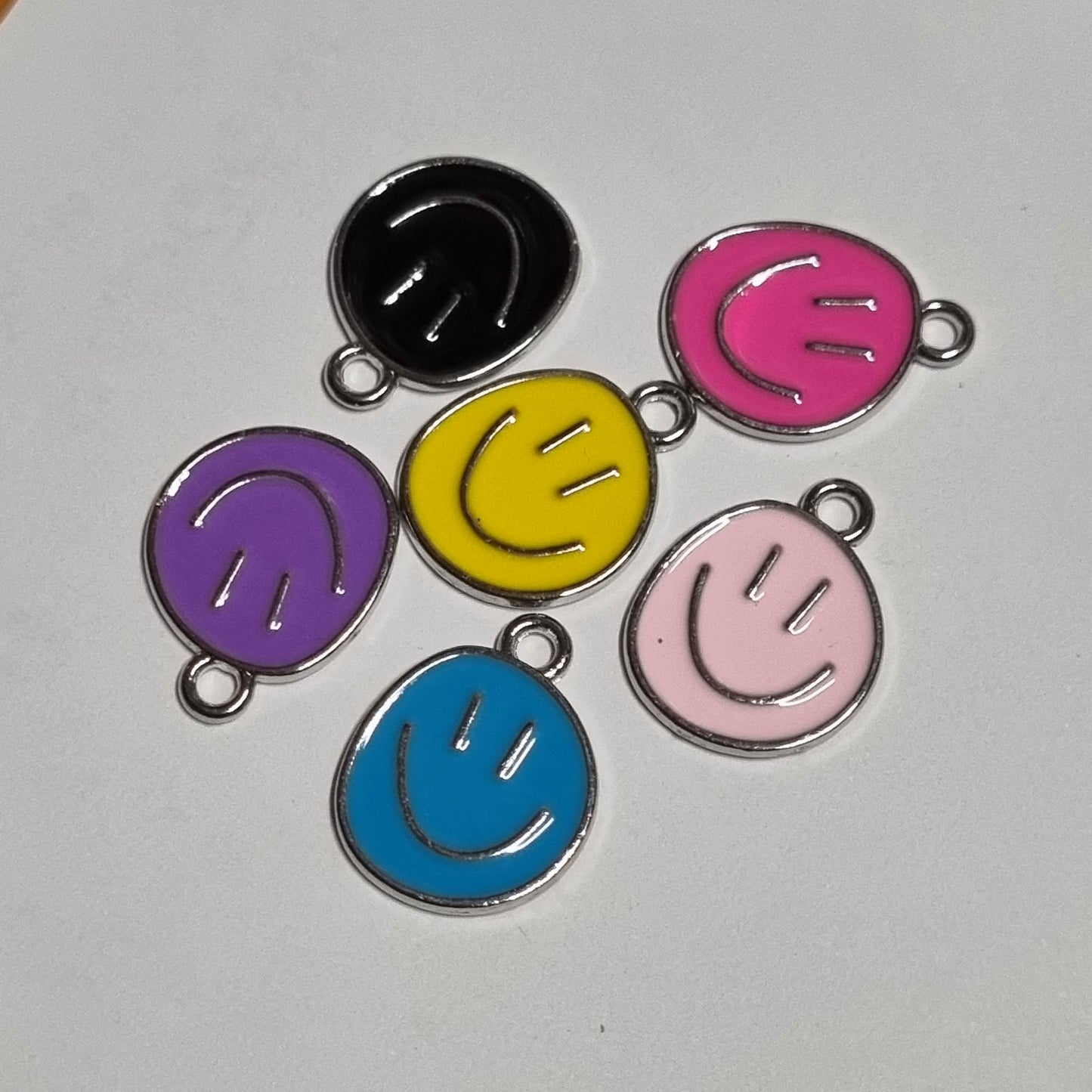 Bedel smiley vorm zilver